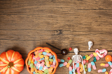 Happy Halloween day with ghost candies, pumpkin,  bowl and decorative. Trick or Threat, Hello October, fall autumn, Festive, party and holiday concept