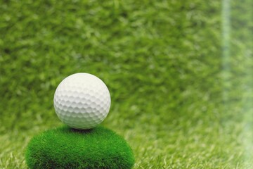 Golf Ball is on green grass