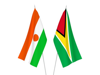 National fabric flags of Republic of the Niger and Co-operative Republic of Guyana isolated on white background. 3d rendering illustration.