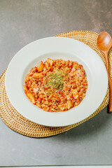 Korean food Kimchi Fried Rice Kimchibokkeumbap, Rice fried with finely chopped kimchi. Beef, pork, onions, green onions, and other vegetables may be added according to taste.