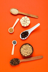 Different ingredients for cooking on orange background