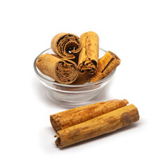 Ceylon cinnamon cuts on white background. Sri Lankan authentic cinnamon. True cinnamon sticks. Pure Ceylon cinnamon. Close up.