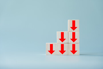 Business decline, performance decrease arrow drop down. Market loss concept diagram in  arrow chart wooden block.