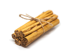 Ceylon cinnamon sticks on white background. 4C Sri Lankan authentic cinnamon. True cinnamon sticks. Pure Ceylon cinnamon. Close up.