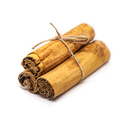 Ceylon cinnamon sticks on white background. H2 Sri Lankan authentic cinnamon. True cinnamon sticks. Pure Ceylon cinnamon. Close up.