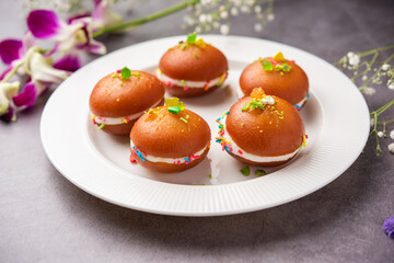Malai Chop or Cream sandwich made using filling Rasgulla or Gulab jamun sweet is a Bengali sweet