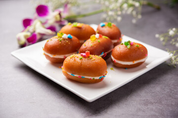 Malai Chop or Cream sandwich made using filling Rasgulla or Gulab jamun sweet is a Bengali sweet