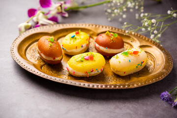 Malai Chop or Cream sandwich made using filling Rasgulla or Gulab jamun sweet is a Bengali sweet