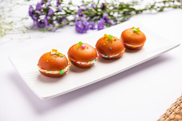 Malai Chop or Cream sandwich made using filling Rasgulla or Gulab jamun sweet is a Bengali sweet