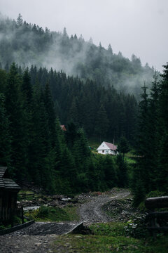 Road With A Bridge To The White House In Cloudy Carpathian Mountains.