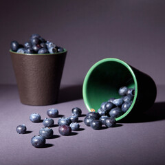 Blueberries in mugs