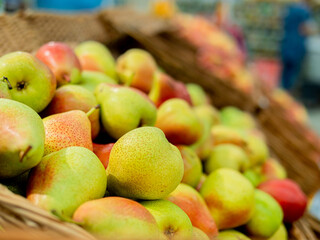 Delicious pears that are sold in the market. Fruit without chemicals. Close-up. Natural vitamins, fruits that help strengthen the immune system in the body from the virus.