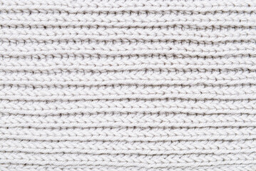 Soft woolen texture, handmade knitted cloth.