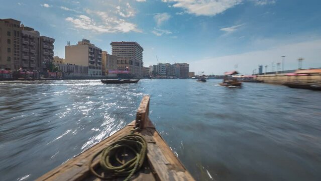 Time lapse taken from boat , abras sail crossing Dubai creek.