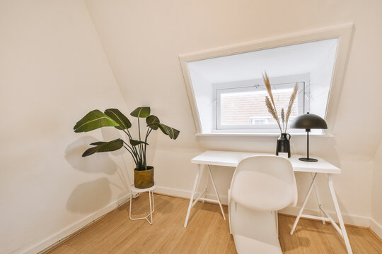 workspace in the attic of a modern residential house