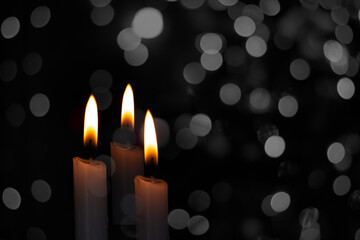 Candle flame shot with bokeh background, idea and inspiration light of hope copy space for text and individual design