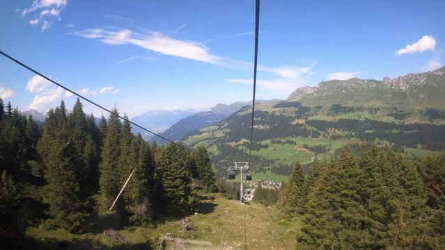 Gondola ride in the canton of Grisons Churwalden. View of the beautiful nature in Switzerland from a gondola lift