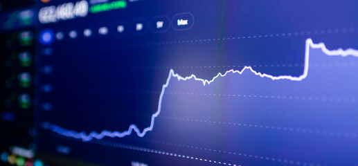 Stock market upwards chart on the screen. Selective focus.Low angle.Banner,advertisement.
