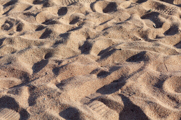 The texture of pure sand on the beach or in the desert. There is free space for the text.