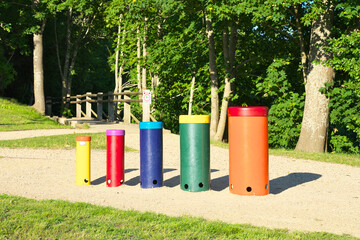 Musical instruments in the open air in the park. Outdoor drums Rainbow Sambas.
