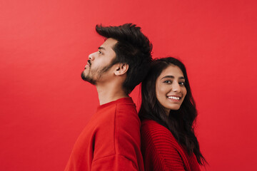 Young indian couple laughing while posing together