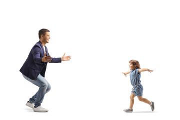 Full length profile shot of a little girl spreading arms and running to her father