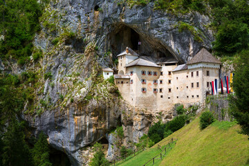 Fototapeta na wymiar The Cave with the Renaissance Predjama Castle, Slovenia