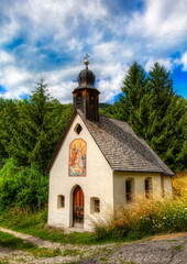 Fototapeta na wymiar Saint Mary Chapel in the Village of Pardell, Val di Funes, Italy