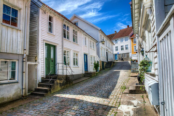 Fototapeta na wymiar Beautiful Cobbled Street in the Southern Norwegian Town Mandal