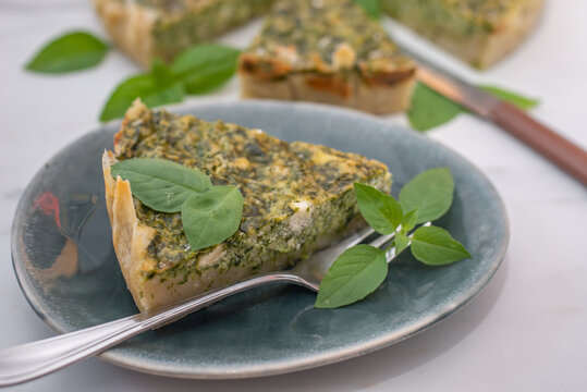 Quiche with spinach - traditional dish of french cuisine