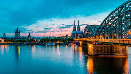 Cologne Koln Germany during sunset, Cologne bridge with the cathedral. beautiful sunset at the...