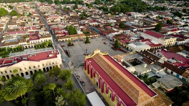 drone shot rotating over the main square, the atrial cross, the convent and the munucipal palace in san cristobal de las Casas in Chiapas