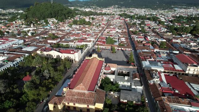 drone shot showing the main square, the church, the atrial cross and the south of the town of san cristobal de las Casas in Chiapas, Mexico