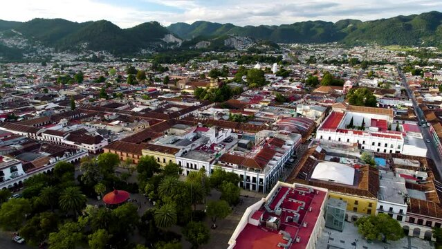 drone shot touring the main square and the town of san cristobal de las casa in chiapas, mexico