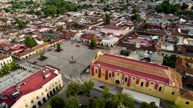 drone shot rotating over the main square and the atrial cross in san cristobal de las casa