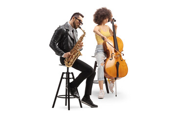 Man sitting and playing a saxophone and a woman playing a cello