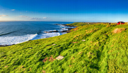 The Nobbles viewpoint at sunset with tourists in Phiilip Island, Australia. Panoramic aerial view