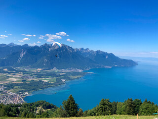 Montreux, Switzerland: 01-08-2022: Panorama of the Switzerland Alpine mountains. Ridges, peaks and lake are visible in the background. Beautiful view in the French Canton.