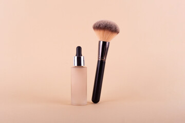 Liquid foundation cream unbranded bottle with makeup brush. Facial correction, liquid concealer,...