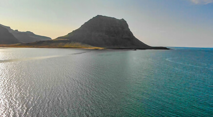 Aerial view of beautiful Grundar Fjord and Kirkjuefell Mountain in summer season, Iceland.