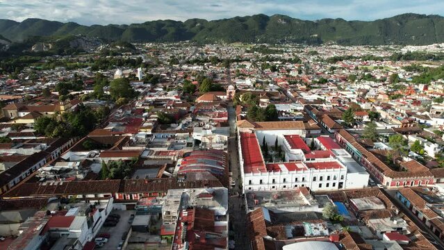 drone shot showing the tourist walkway next to the church in san cristobal de las casa, chiapas, mexico