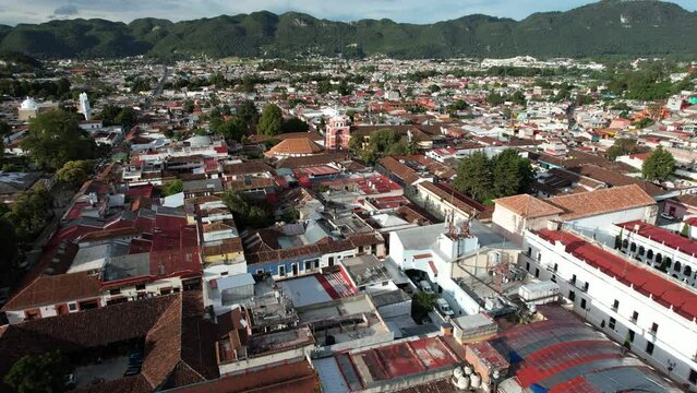 drone shot frontally showing the Moorish constructions of San Cristobal de las Casas in Chiapas Mexico