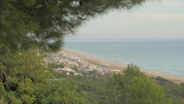 View of the seashore with birds and the beach in castelldefels spain