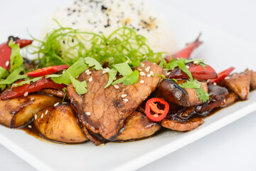 Thai style rice with chicken and vegetables in a plate, ultra macro photo

