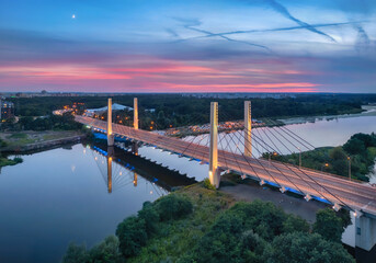 Aerial view of Millennium Bridge (Most Milenijny) at dusk in Wroclaw, Poland
