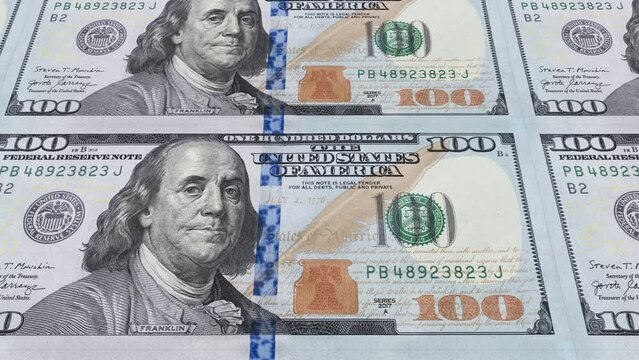American 100 dollar banknote printing. Business and Finance concepts. Seamless loopable animation.