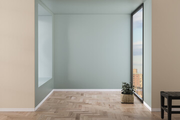 Room with green and beige walls, wooden floor with plant. Bright room interior mockup. Empty room for mockup. 3d rendering
