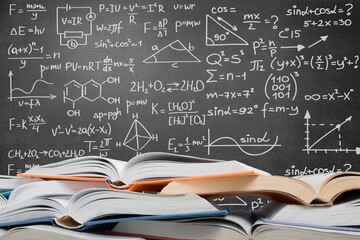 Math geometry formulas on board background and books.