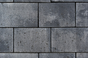 Fototapeta premium A detailed view of the tiles that are made of concrete. Background for multiple use.