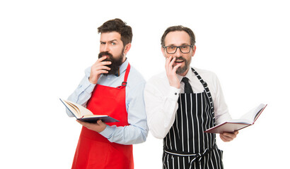My job. puzzled bearded men with recipe book. catering business. seating plan. partners cook cooking. Culinary ingredient. menu planning. happy chef team in apron. cafe and restaurant opening